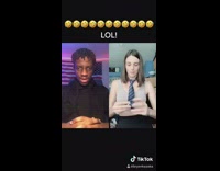 Guy sitting black stare not amused