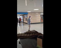 Man dancing in the middle of penn station