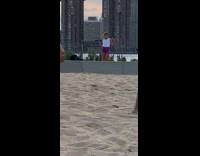 Young girl white top dance tiktok sand