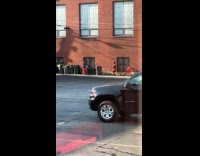 Woman black and red dress sidewalk dance