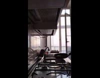 Man flipping meat on pan falls on sink 