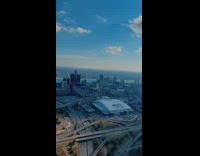 Guy rides helicopter around detroit 