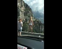 Blonde girl white lingerie shorts cliff fence