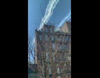 Planes fly over buildings in New york city