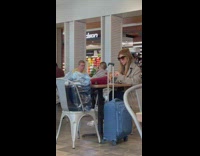 Woman selfie poses with a glass of wine