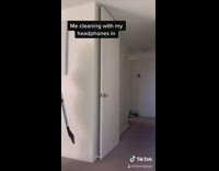 Girl sings with headphones in expectations reality 