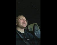 Guy freestyle raps to hip hop beat inside car, wow