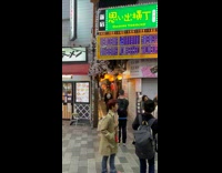 Collab IITW - Woman in black sweater poses at the small alleyway