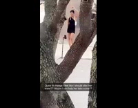 Girl one shoulder dress between tree hole