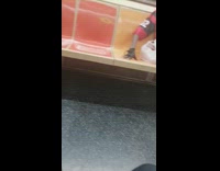 Guy rainbow umbrella hat red shirt subway 