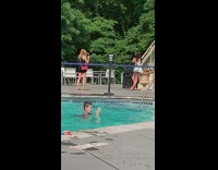 Lady tells girl she looks great pool