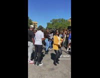 Ladies in a Line Stroll Dance Simultaneously