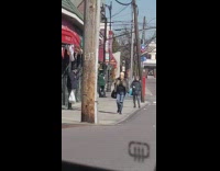 Corona virus alien mask lady crosses street