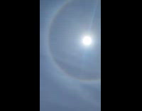 Rainbow Halo seen around the sun in the sky