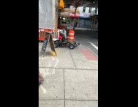 Guy rides kart strolls on the street 