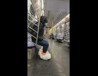 White trash bags on feet person subway 