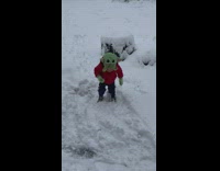 Toddler wearing yoda fit screaming while standing in snow then cries