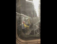 Yellow clown costume mask guy subway train 