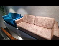 Couple looks for sofa tries the display