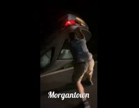 Guy tries to flip upside down car over and gives up 