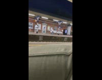 Woman in white sweatshirt tiktok dance on the train station