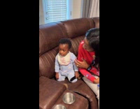 Baby gets dramatic called out for chewing tv remote