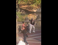 Man and Woman tiktok dance at park