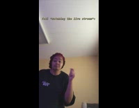 Woman in hair bonnet dances to Wii theme song, Tati watching live stream caption