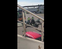 Women picture with police security motorcycles
