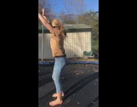 Girl yellow shirt tries to backflip on backyard trampoline and scorpions