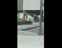 Woman in saree with boxing gloves at the parking lot