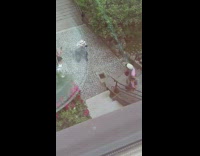 Guy wrap printed cloth on head stairs