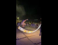 Man slips doing fire jump rope