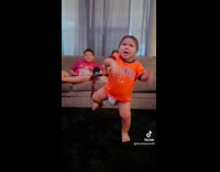 Collab VIBES - Little boy orange shirt dances to music of NSYNC
