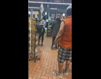 Person with roller skates cat ears and blue jacket in supermarket  Pt 1