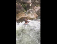 2 guys flow backwards in river 