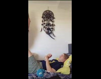 Woman grabs guys phone with her buttcheeks