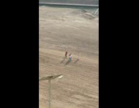 Three women white top tiktok dance sand