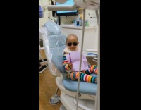 3 year old girl at dentist with sunglasses