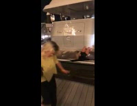 Black shirt lady jumps slips backwards fail 