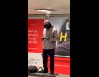 Head of man in hoodie produce steam