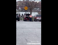 DJ perform at park behind car