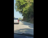 Three people hands outside car phone trip
