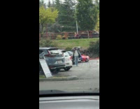 Collab IITW - Man films himself walk near parked cars