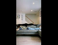 Guy and girl on couch change positions