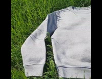 Sweater with cat screen printed on it