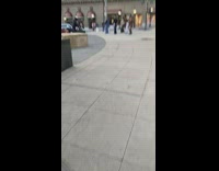 Group of People Tediously Dance on Sidewalk