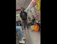 Two guys take turns dancing on subway 