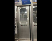 Note subway doors says Suck a dick
