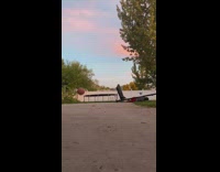Guy dunks ball basketball hoop falls over